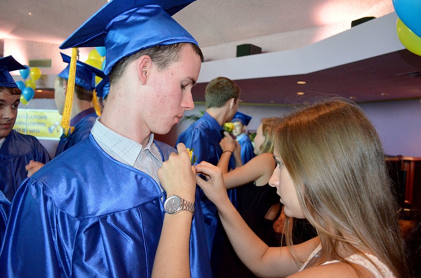 Connor Grooms receives his boutonniere.