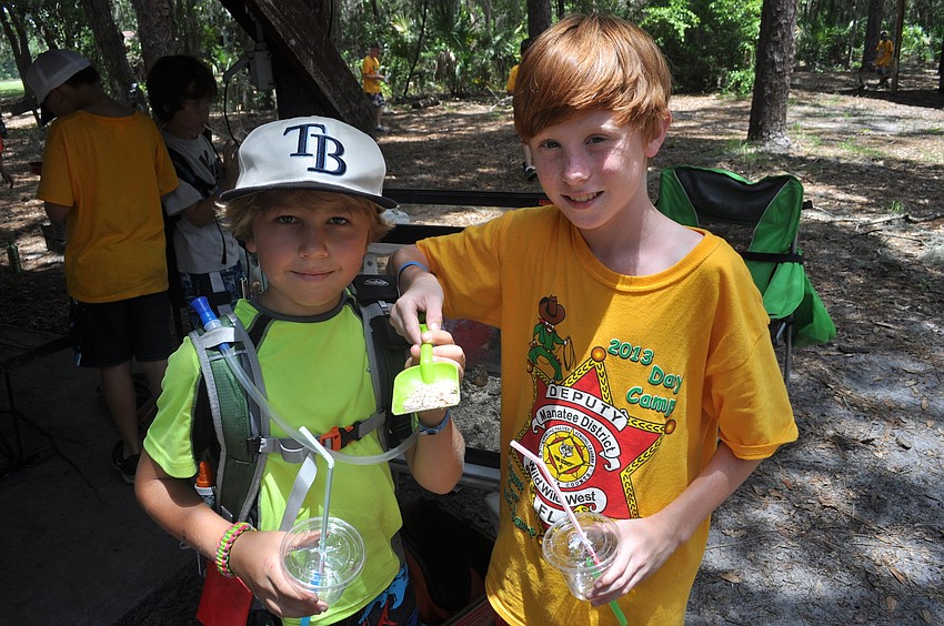 Jack Sanders and Jared Root showed off some mealworms.
