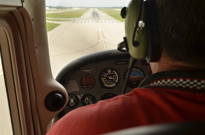 Pilot Jeff Walston always goes through a checklist before taking off to make sure the ride goes well and the landing is smooth.