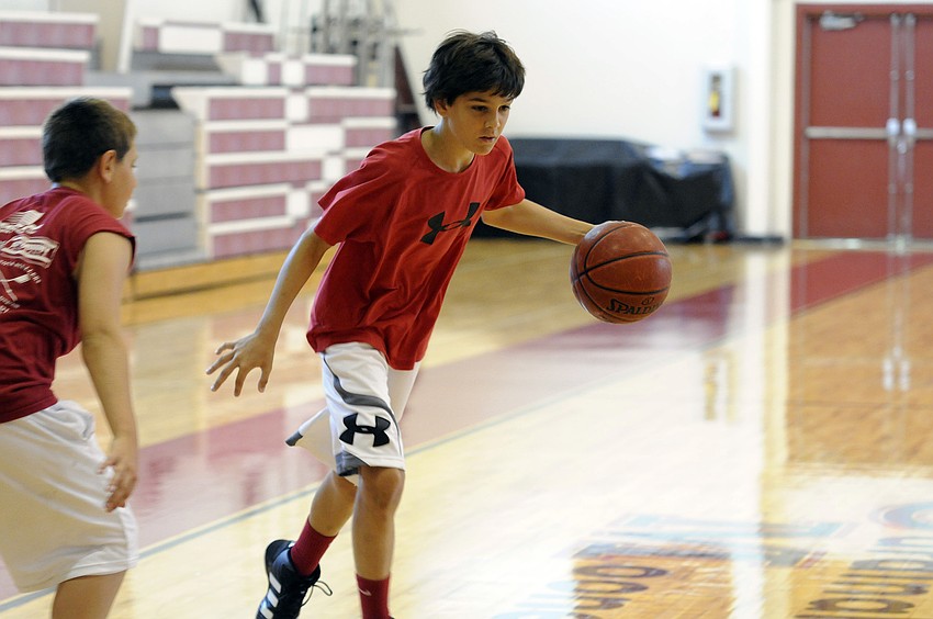 Logan Morrissey, 12, enjoyed attending his first Cardinal Mooney basketball camp.