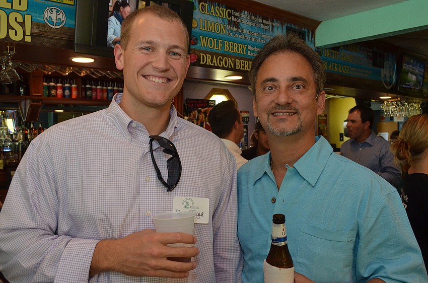 Regan Teague of Day Hagan Associates and Tom Kouvatsos of Village CafÃ©