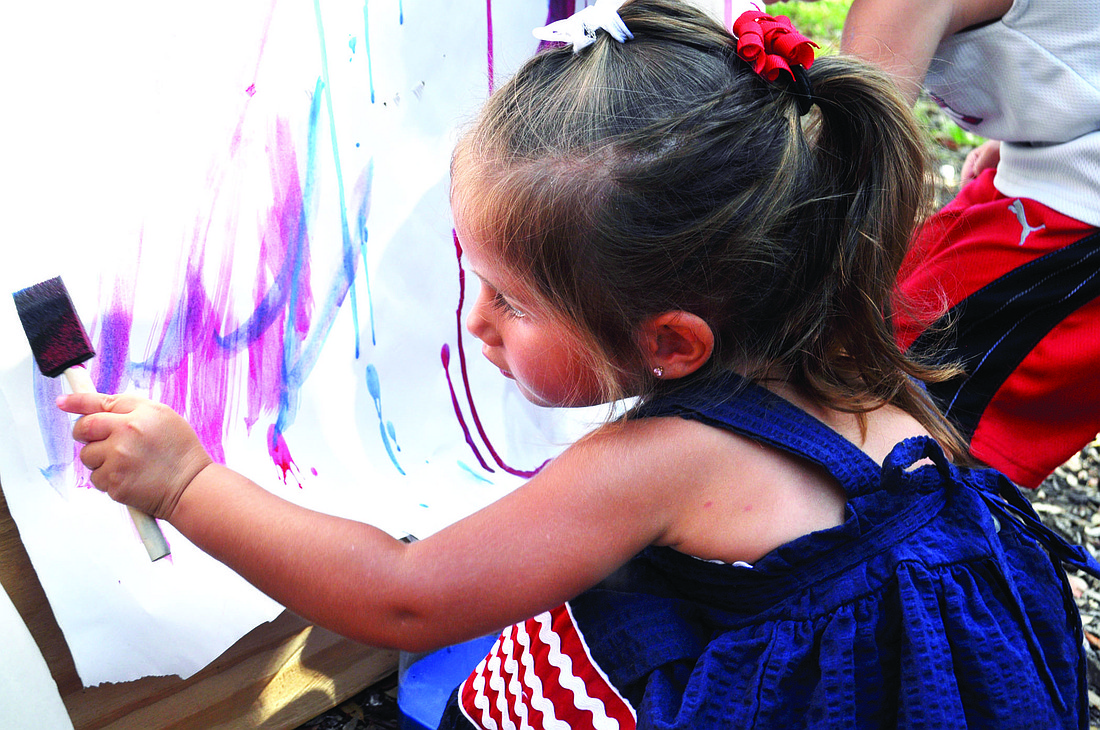Isabella Torres had fun painting at last year's Freedom Fest.