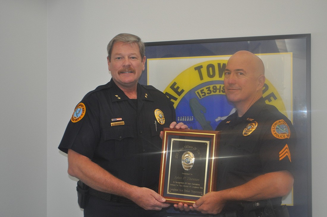 Longboat Key Police Chief Pete Cumming with Police Officer John Thomas