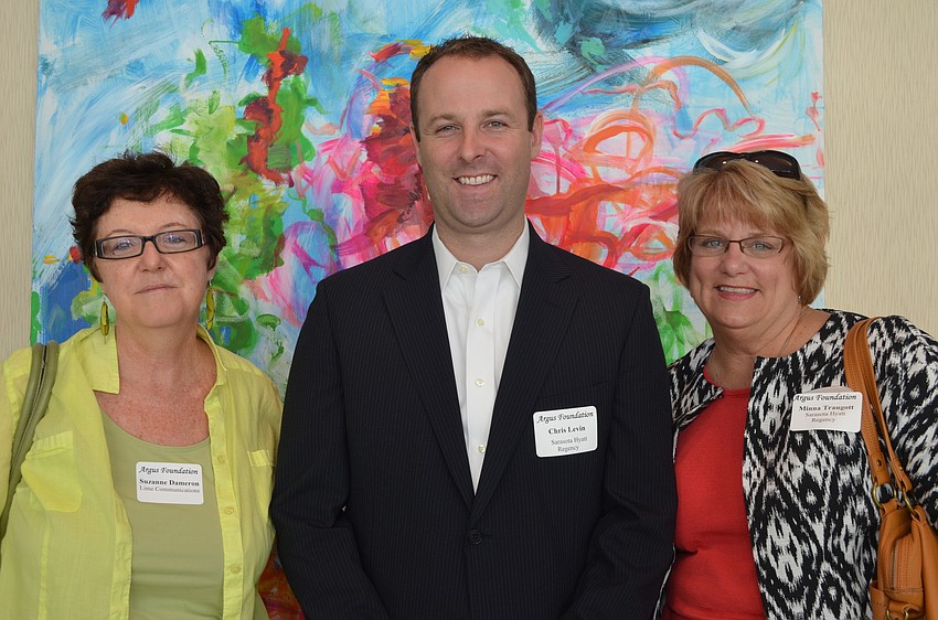 Suzanne Dameron, of Lime Communications, Chris Levine and Minna Traugott, of the Sarasota Hyatt Regency