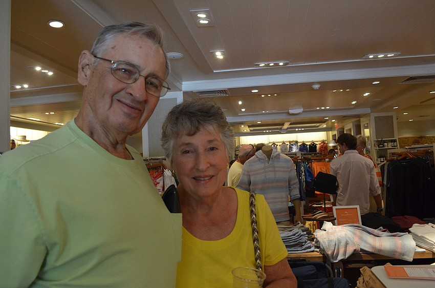 Martha and John Milton browse the store and enjoy complimentary basil mint lemonade.