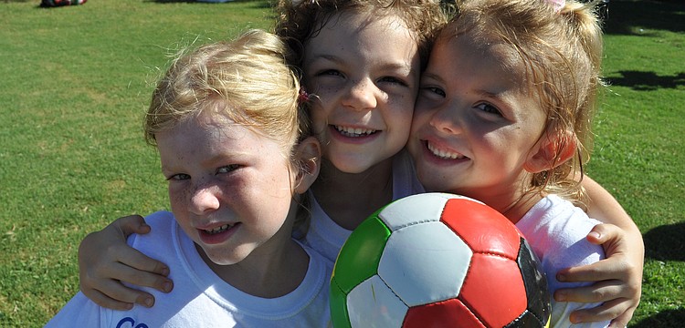 Hannah Pope, Sarah Smith and Jaynie Hamm enjoy learning the sport.