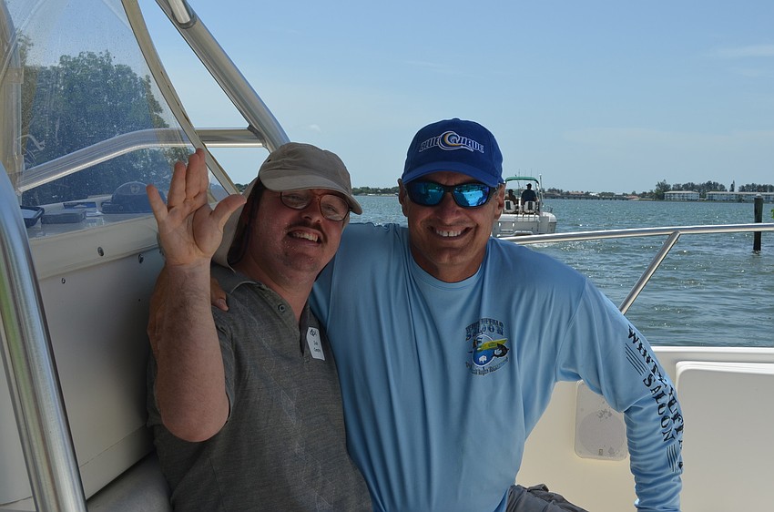 Scott Stottlemyer helped Josh Compton on the fishing trip. Compton caught eight fish including trout and ladyfish.
