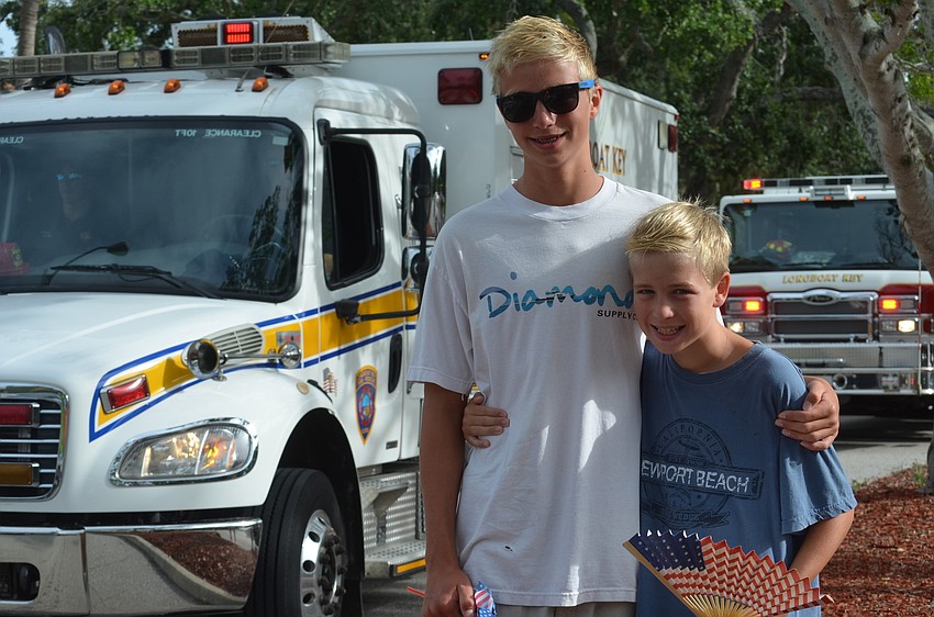 Teagan Cheney, 13, and his brother Brennan, 10, appeared on the cover of the Longboat Observer for Freedom Fest a few years ago when they were much younger.