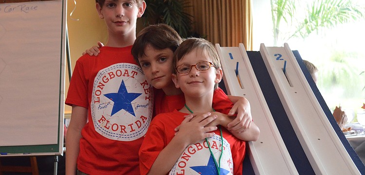 Brothers Beckett, Teague and Sullivan Dillon before the Potato-car race