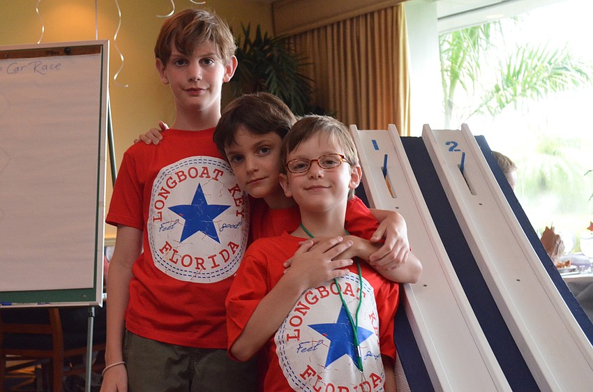 Brothers Beckett, Teague and Sullivan Dillon before the Potato-car race