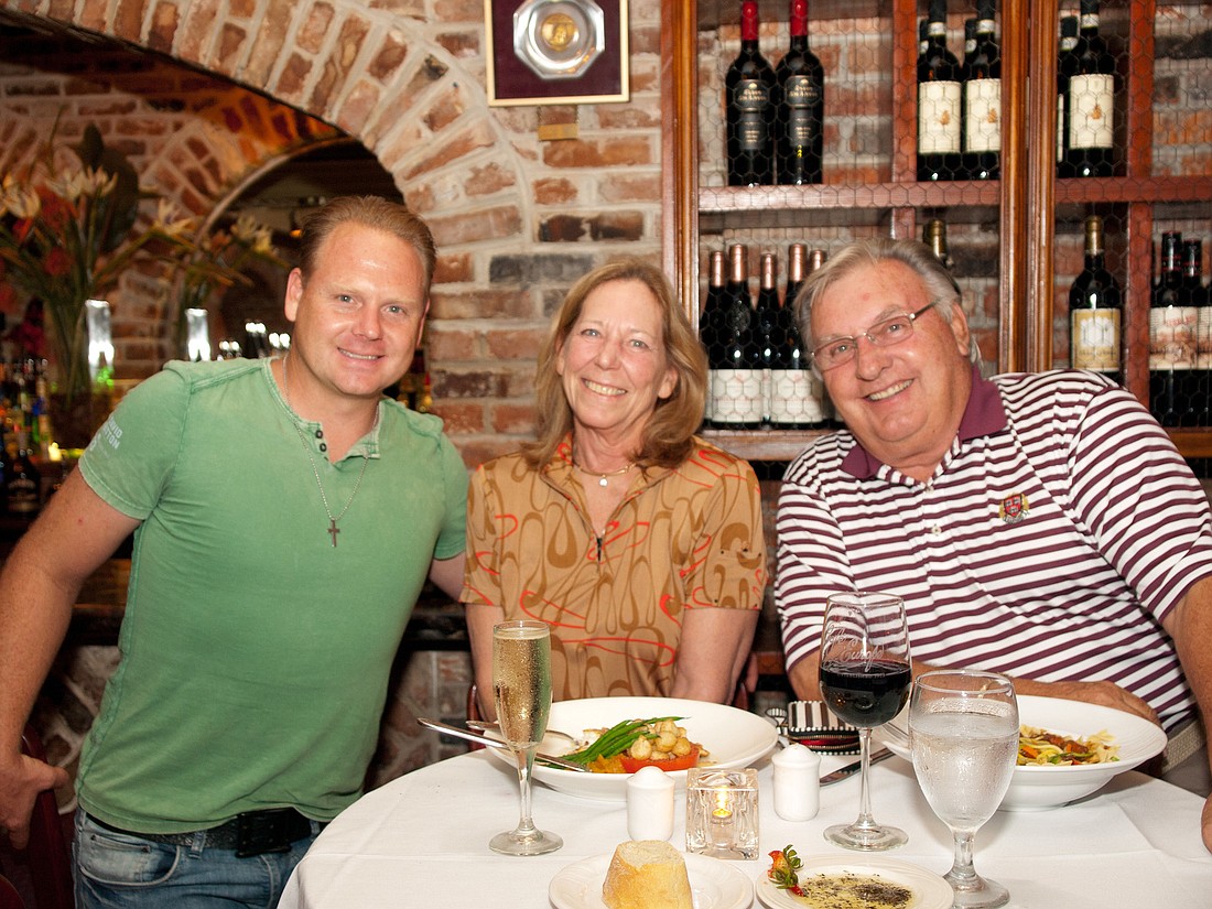 Nik Wallenda, Cafe L'Europe owner Betsie Coolidge and David Boyce. Courtesy photos.