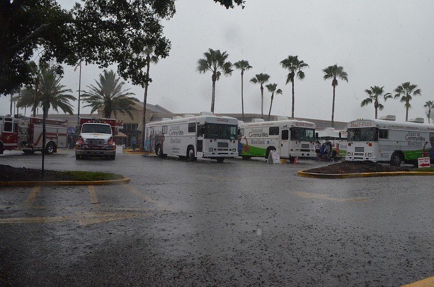 Summer rain sporadically pours down on the blood drive.