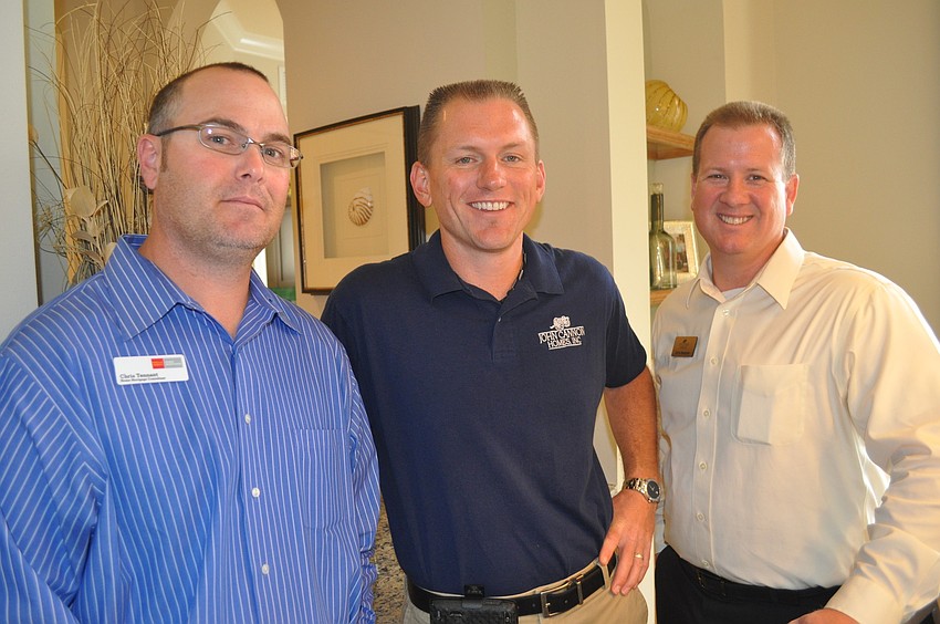 Chris Tennant of Wells Fargo with Leif Schmidt and Derin Hampton of John Cannon Homes