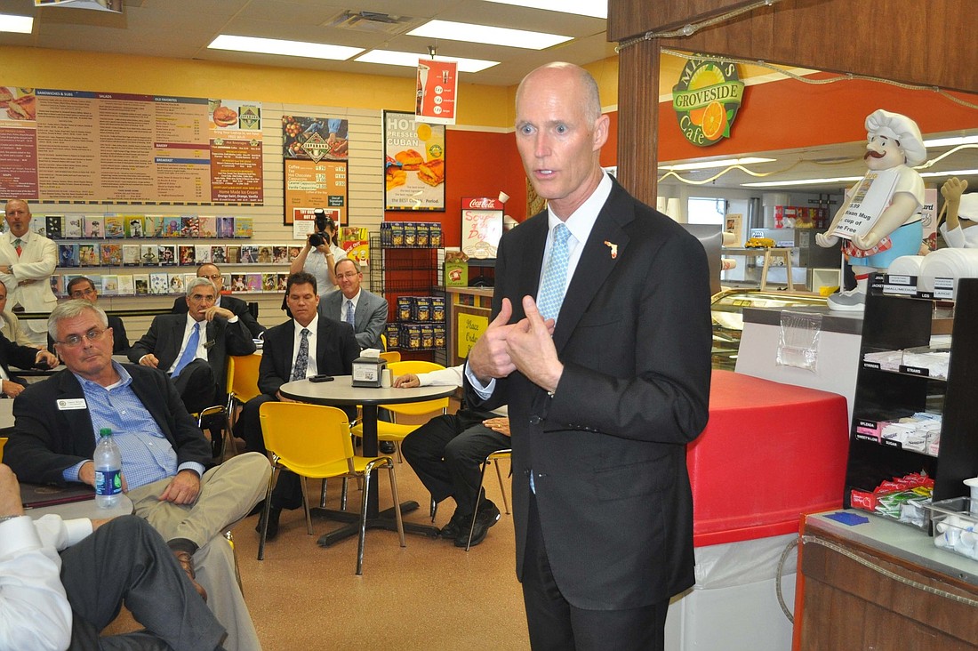 Gov. Rick Scott spoke with business professionals at Mixon Fruit Farms Thursday afternoon.