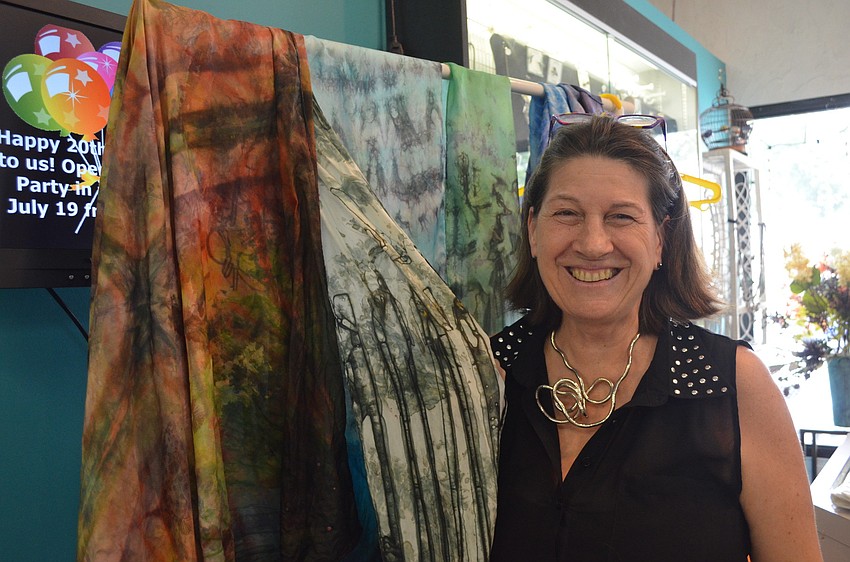 Marlene Glickman demonstrates how to hand dye a silk scarf.