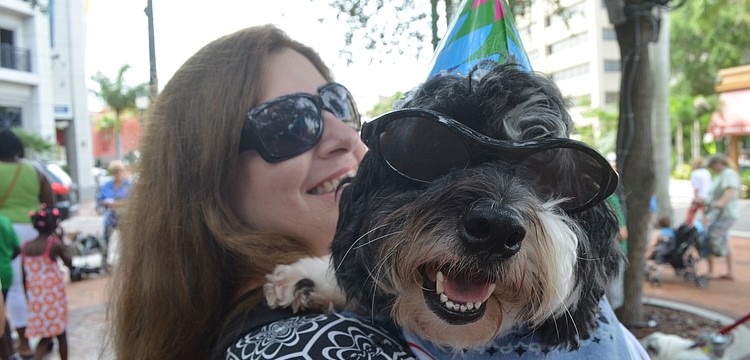 Lisa Hillje and her 4-year-old Havanaese, Rafi, line up for the costume parade.