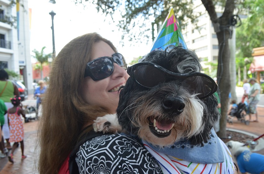 Lisa Hillje and her 4-year-old Havanaese, Rafi, line up for the costume parade.