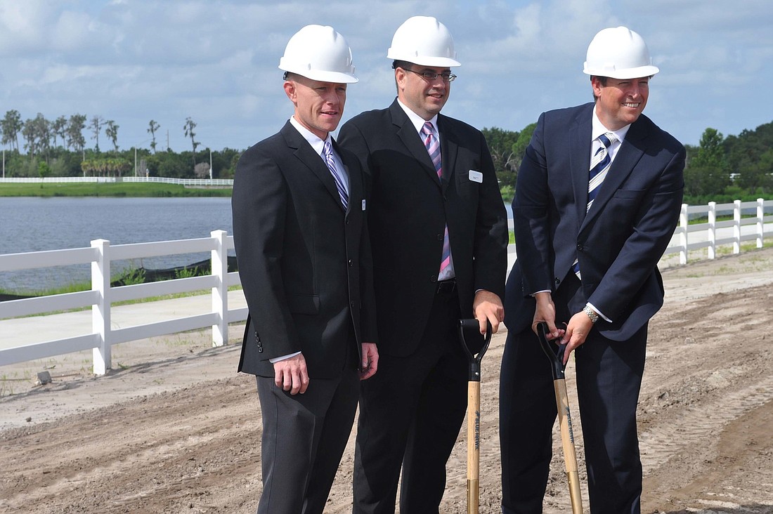Lennar Director of Sales and Marketing Matt Devereaux, Lennar area Sales Manager Matt Figlestahler and and Sen. Bill Galvano participate in the ceremony.
