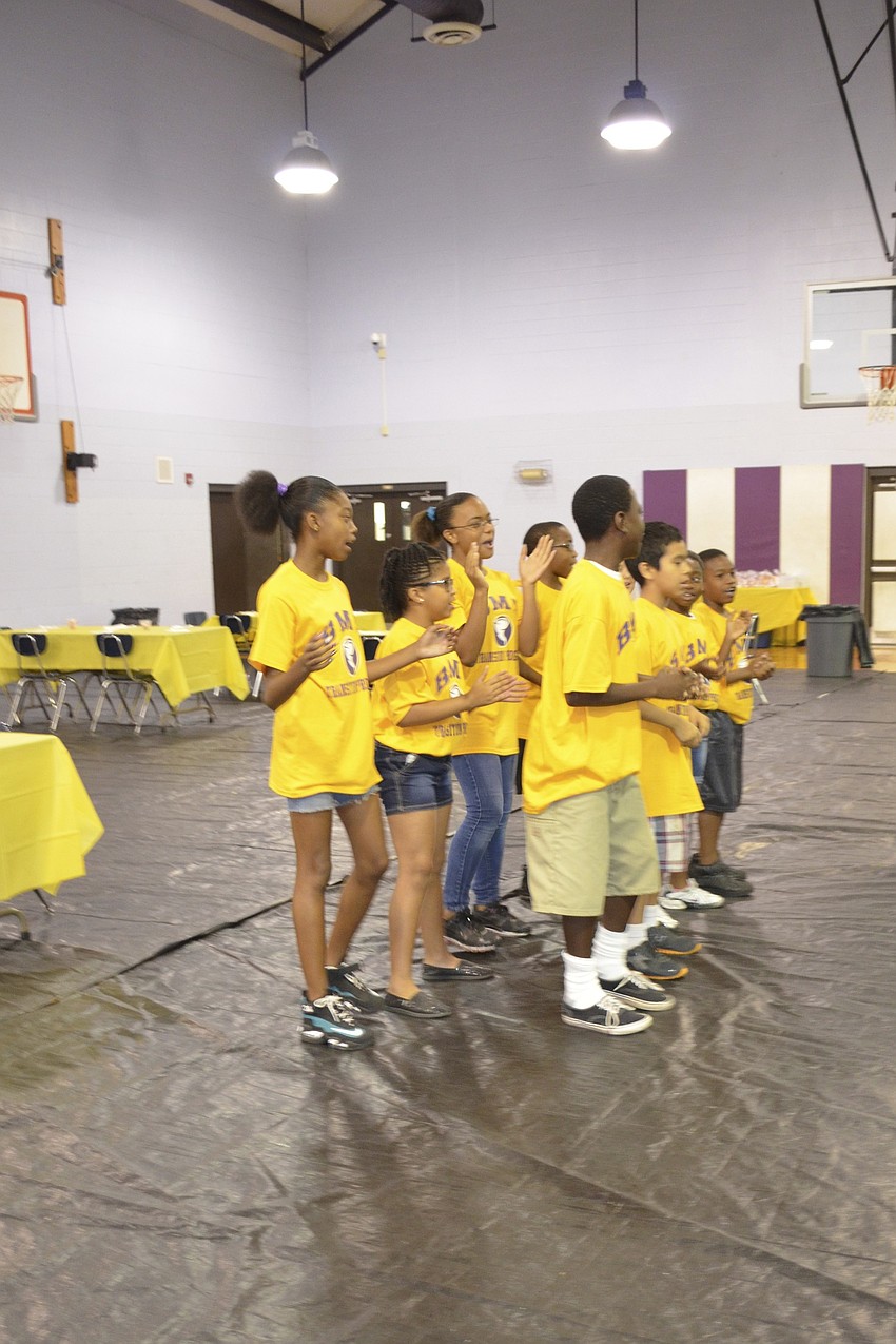 Students sing and dance to a song about transitioning to middle school.