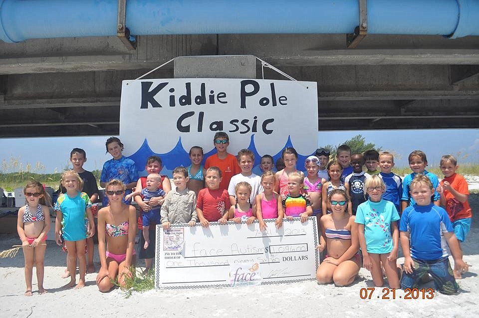 Children and parents raised $1,200 for Face Autism Inc., at the Kiddie Pole Classic Fishing Tournament 2013.