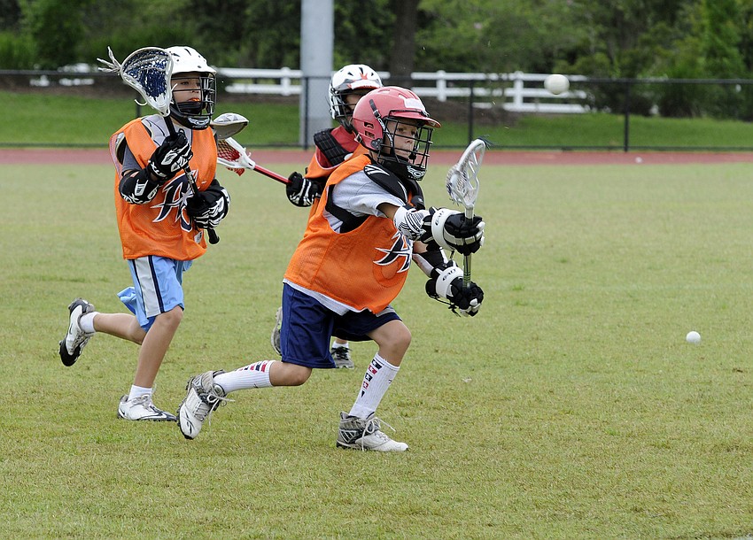 Eight-year-old Oliver Girad attempts a shot.
