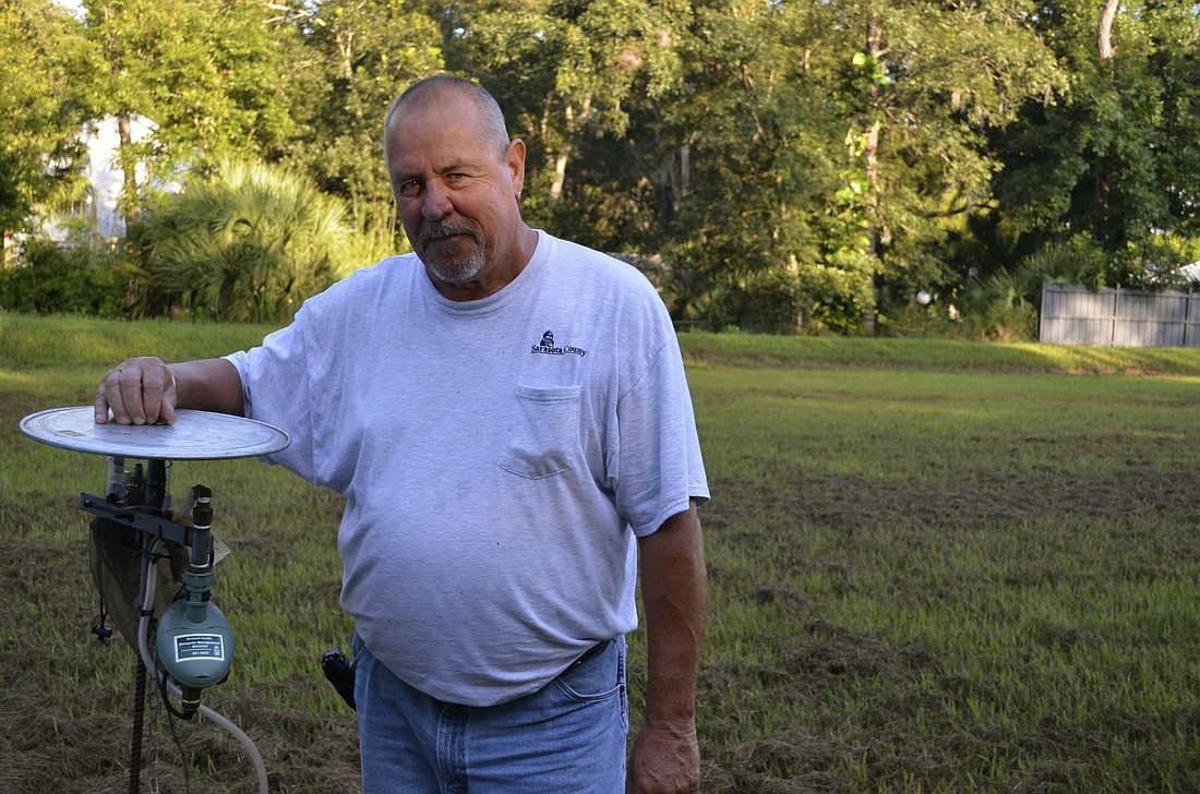 John Goreham, an eight-year veteran of Sarasota County Mosquito Management, uses a variety of techniques to control the mosquito threat, including pesticides, a local species of fish that eats mosquito larvae and sentinel chickens.