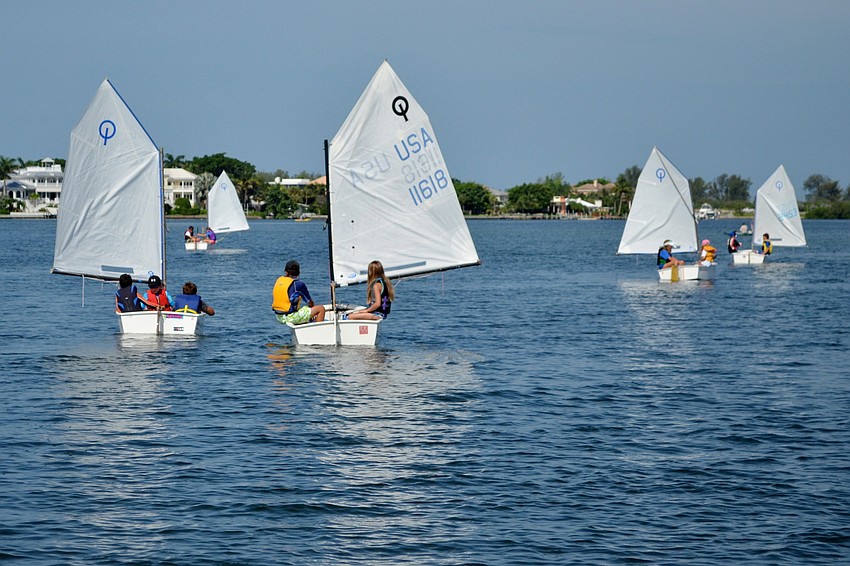 Sarasota Yacht Club campers sail through Sarasota Bay.