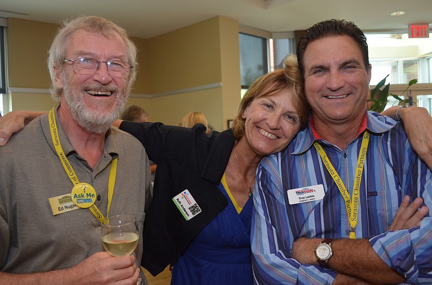 Ed Nuget of Cornerstone Sign and Graphics, Ruth Anderson of Digital Image Business Solutions and Troy Larkin of WSRQ