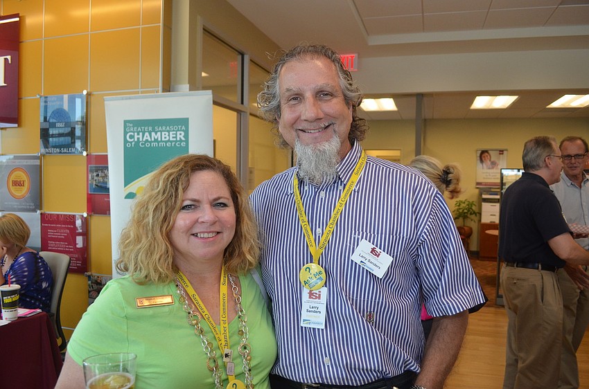 Sharon Litchfield of TPC Prestancia and Larry Sanders of Forms Specialist, Inc