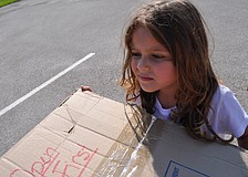 Athena Henson, 4, helps to build the wall of Jericho.