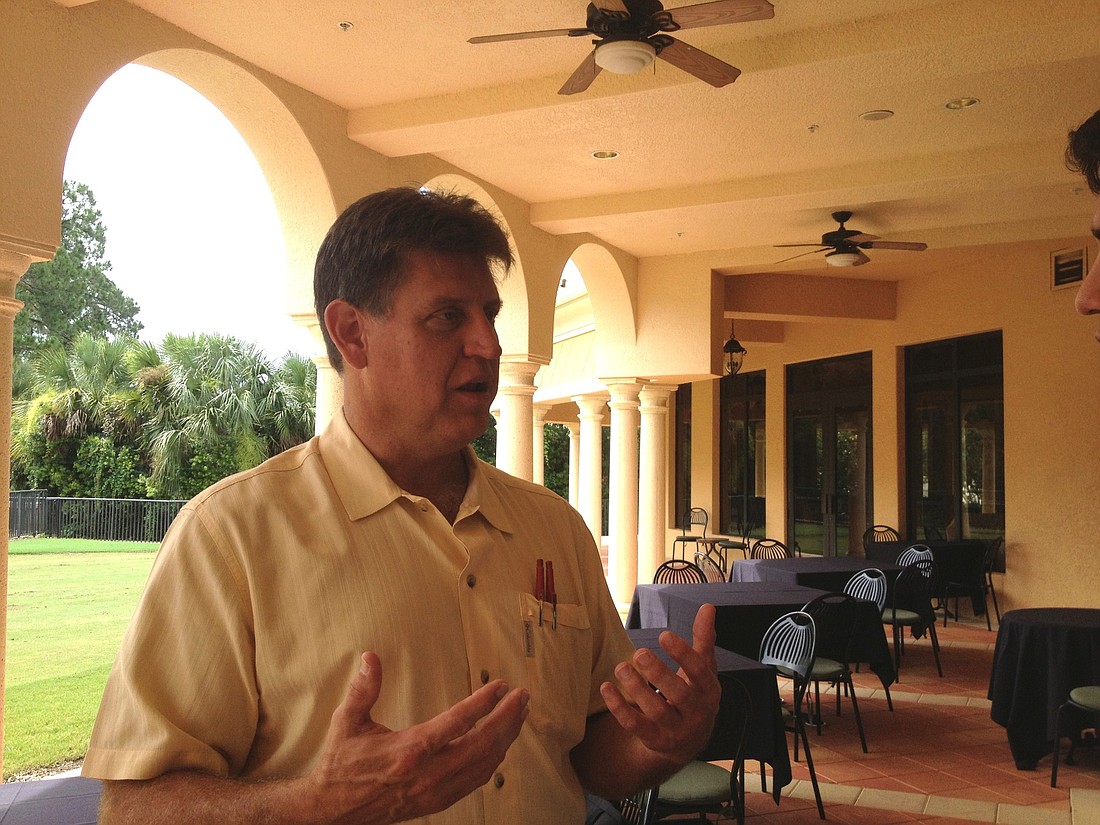 Dr. Robert Marbut spoke to community leaders at Venetian Golf and River Club July 18.