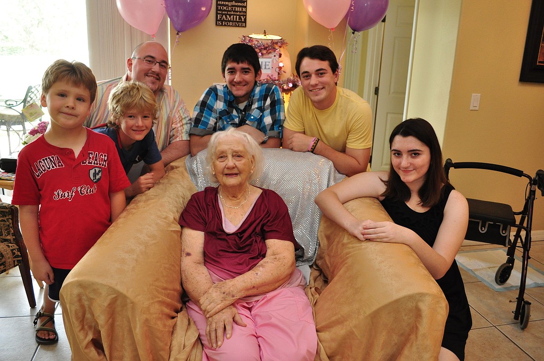 Birthday girl Ruth McBurney is pictured with her grandchildren, from left: James Lentz, Cole Wise, Dan Bettenhausen, Michael Sarna, Matt Bettenhausen and Mia Sarna.