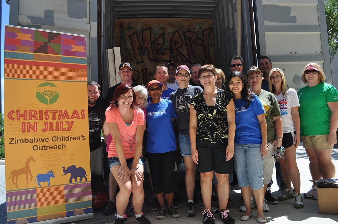Three weeks ago, Bayside Church staff gave its members containers to fill with $15 worth of goods and school supplies. The churchgoers stuffed boxes full of those containers into a truck bound for Zimbabwe Tuesday.Ã‚Â