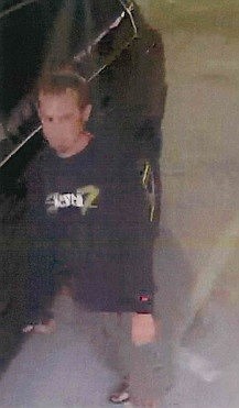 Sarasota Police believe the unidentified man in this picture is responsible for a July 23 burglary in the Palm Avenue Parking Garage.