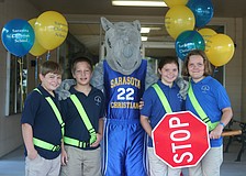 Fifth graders Dru Cappar, Josh Streitmatter, Blaze the mascot, Paige Palmer and Faith Rice
