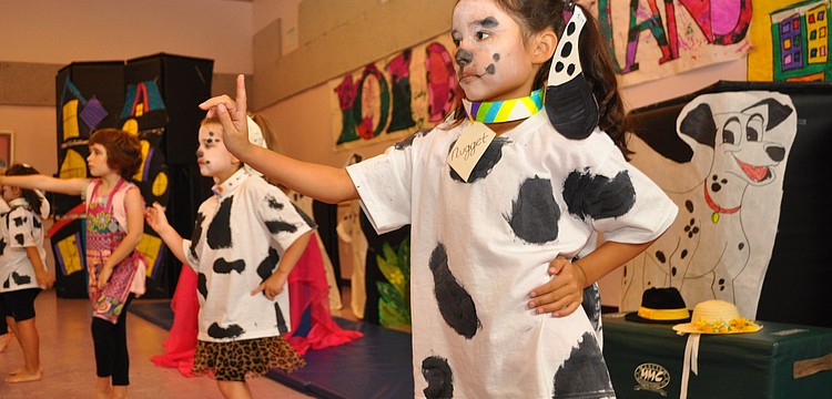 Micaela Castro, 7, dances as a puppy named Nugget.