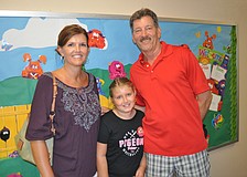 Melissa and Kevin Redman with their son, Karson a fourth grader at Tara Elementary