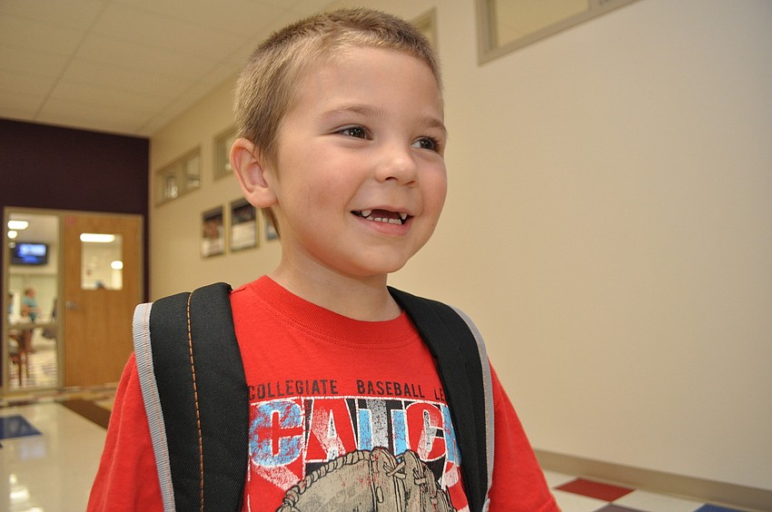 Gullett Elementary kindergarten student Bradley Brewer, 5,  was eager to get to his new classroom.