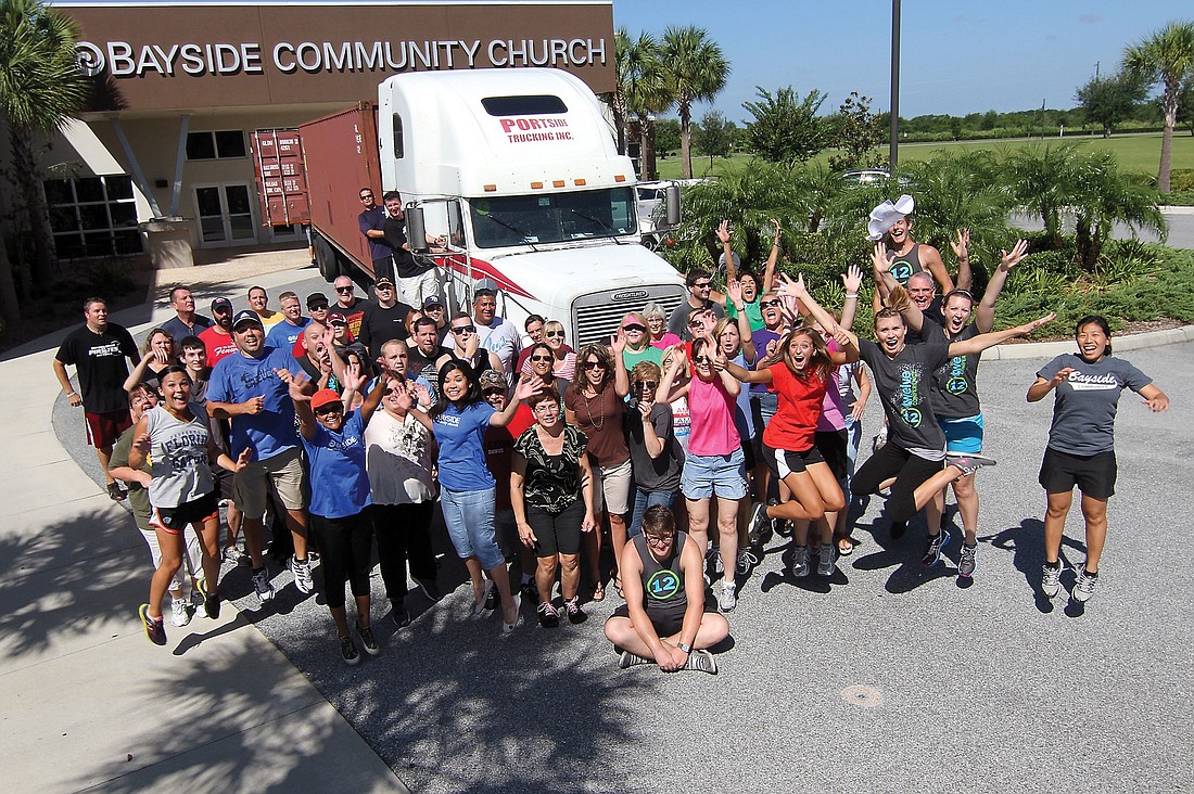 Bayside Community Church staff and members prayed the gifts will make it to Zimbabwe as the boxes take a three-month journey across land and ocean. Courtesy photo