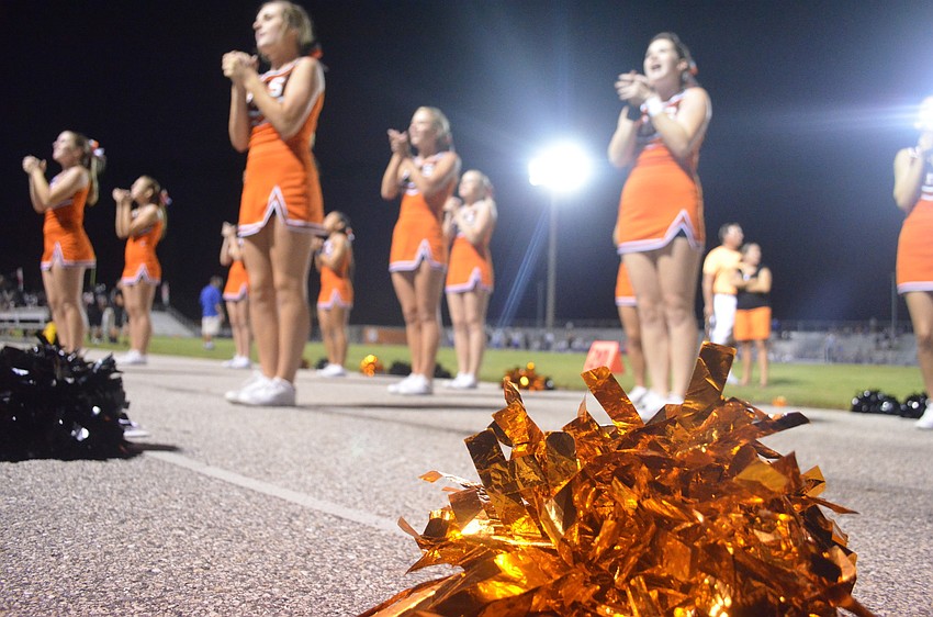 Sarasota High School cheerleaders energize their classmates.