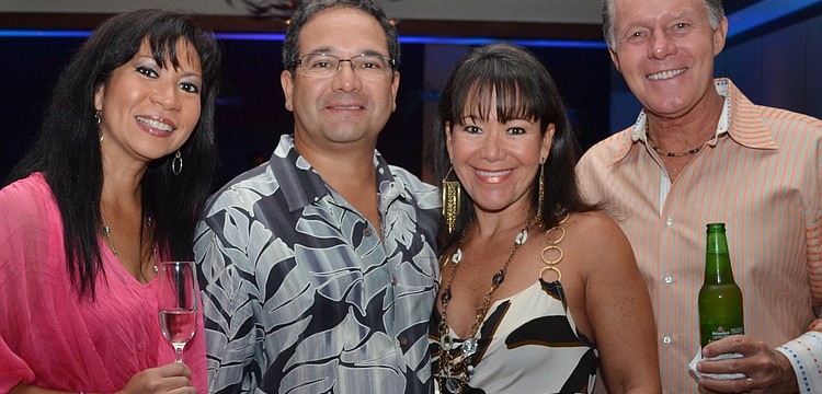 Eileen and Adam Smith with host Sandra Ceshker and George Ceshker