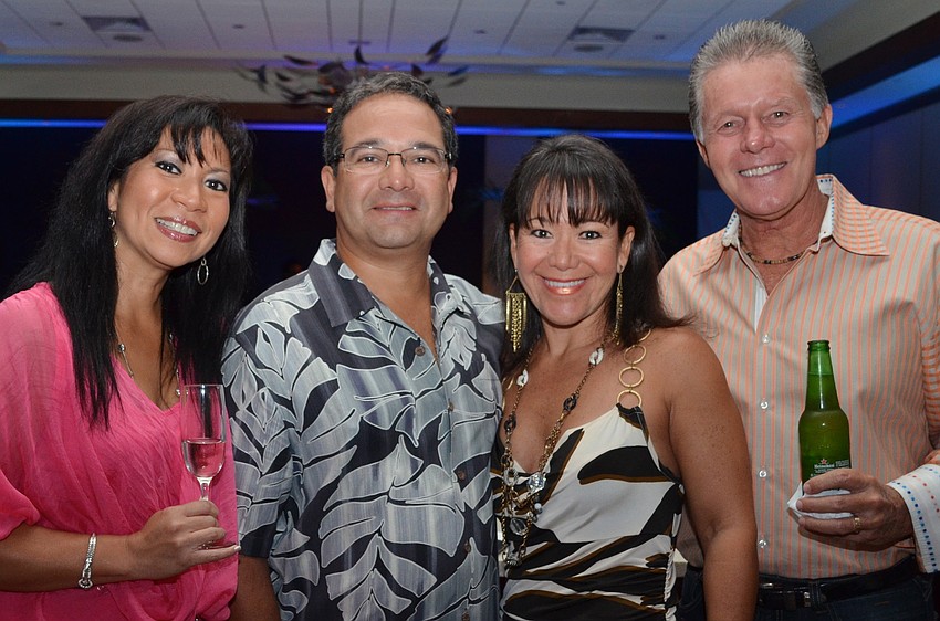 Eileen and Adam Smith with host Sandra Ceshker and George Ceshker