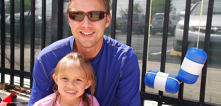 Nora and Matthew Supernaw relaxed in the shade.
