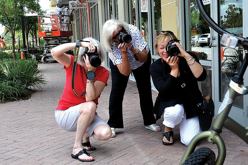 Mary Nell Moore, Mindy Towns and Patricia Reed explored Lakewood Ranch Main Street to find subjects for photographs that would fit a unique theme.