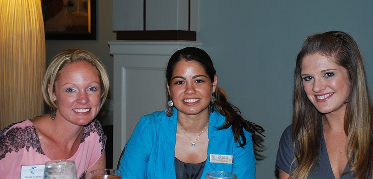 Blaire Green, Ashlyn Gueits and Nicole Stablein enjoy lunch and a lecture.