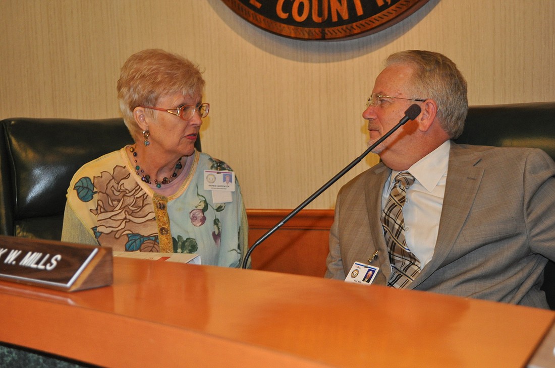 Karen Carpenter, Manatee County School Board chairwoman, and Superintendent Rick Mills took comments about the 2013-14 fiscal year budget at a public hearing today.