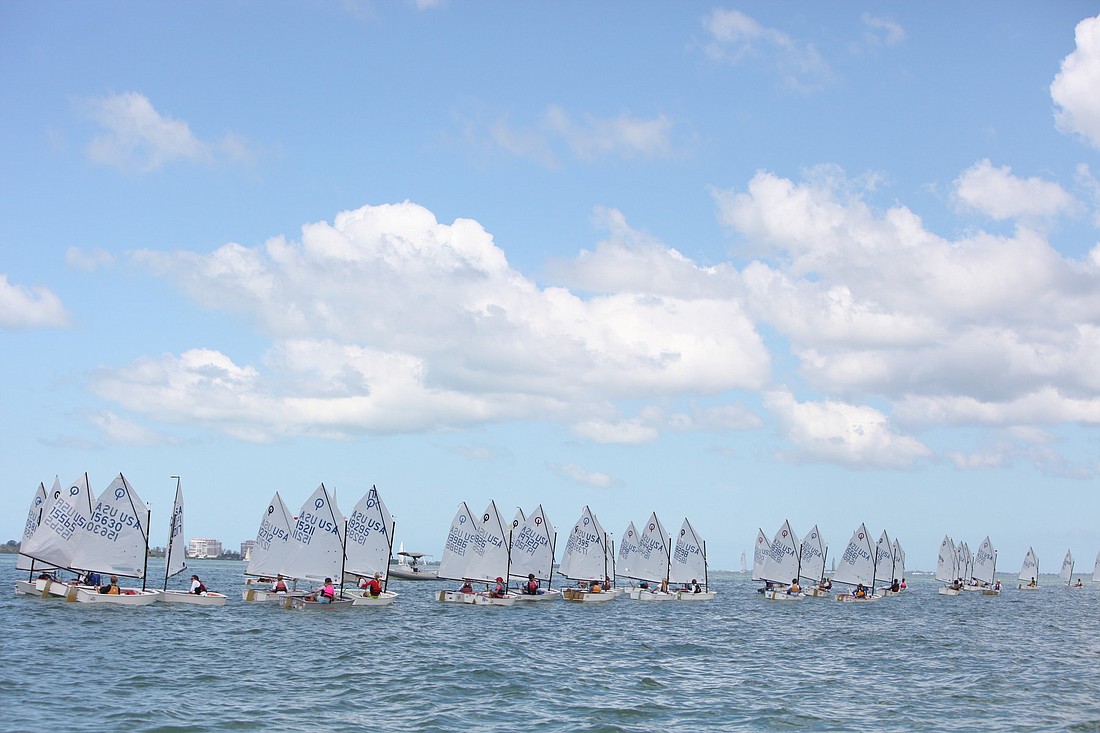 The Optimist Fleet lines up for its first race of the day during the 66th annual Sarasota Sailing Squadron Labor Day Regatta in 2012. File photo.