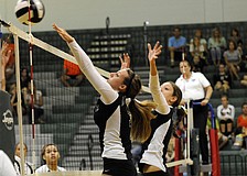 Lakewood Ranch senior Lauren Owen goes up for a block during the Lady Mustangs 3-0 victory over Sarasota Sept. 3.
