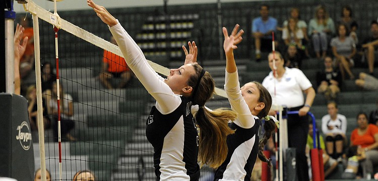 Lakewood Ranch senior Lauren Owen goes up for a block during the Lady Mustangs 3-0 victory over Sarasota Sept. 3.