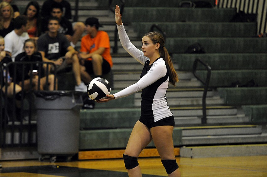 Lakewood Ranch junior Kelley Ainsworth prepares to take the opening serve.